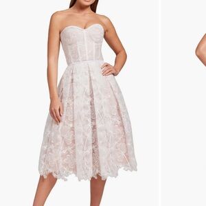 Olivia Strapless Lace Dress
NADINE MERABI